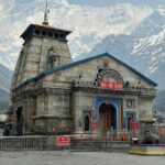 Kedarnath Temple with snow-capped mountains in the background