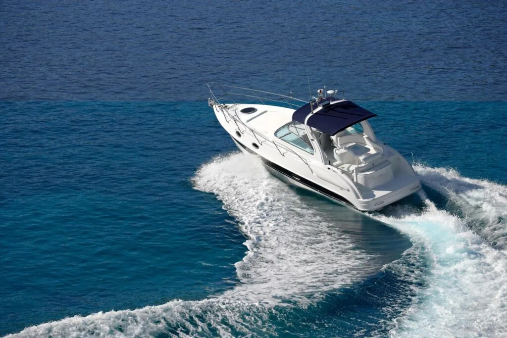 Luxury speed boat charter cruising in the ocean – FlyAvCare speed boat rental service in Mumbai and Goa