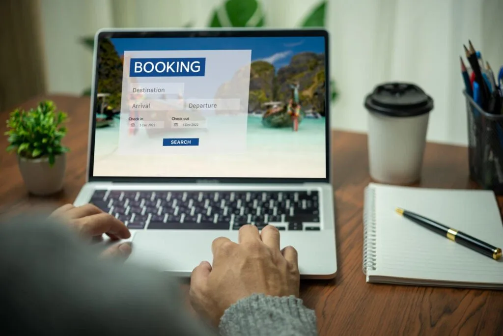 Online private jet booking on laptop – Fly Avcare charter services